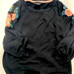 Could not be cuter, this 3/4 sleeve black embroidered sweatshirt